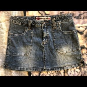 Stretchy Denim Mini Skirt by One Tuff Babe
